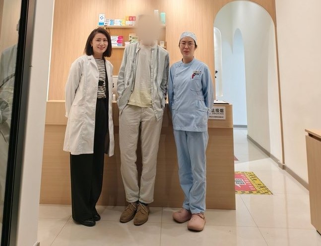 International guest standing with Leyan Dental staff